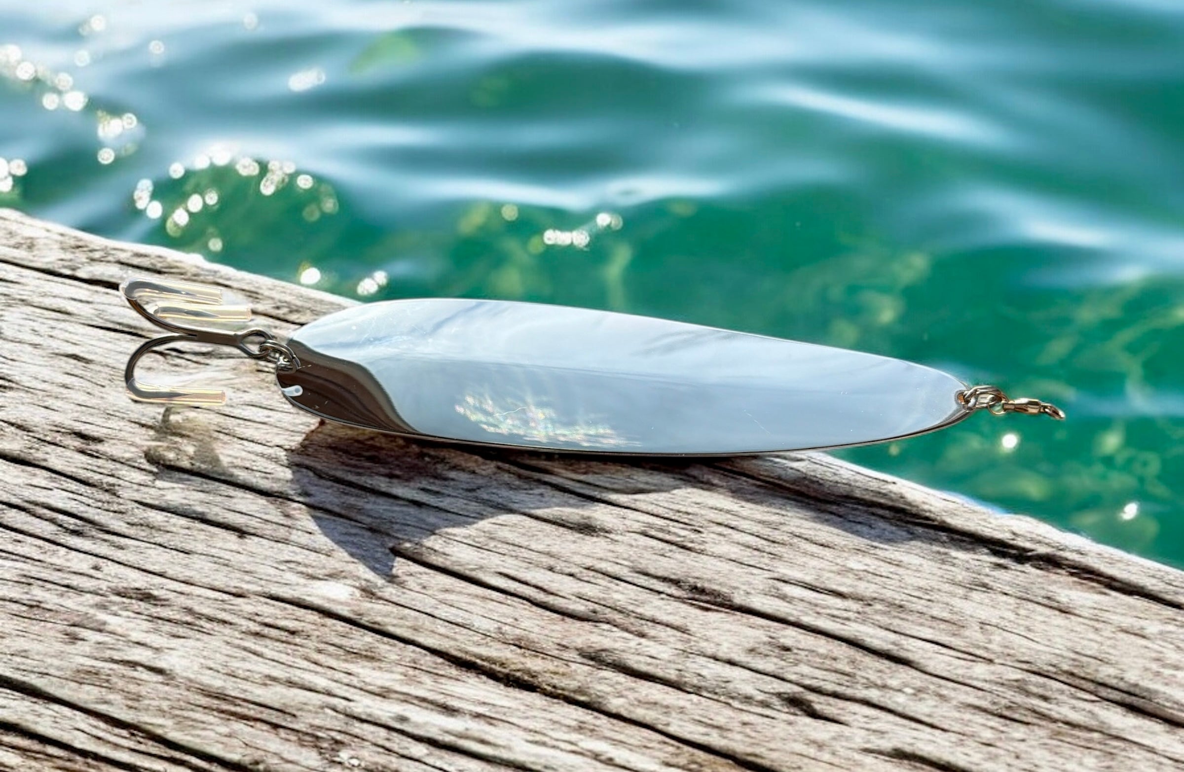 silver flutter spoon 9" on the dock