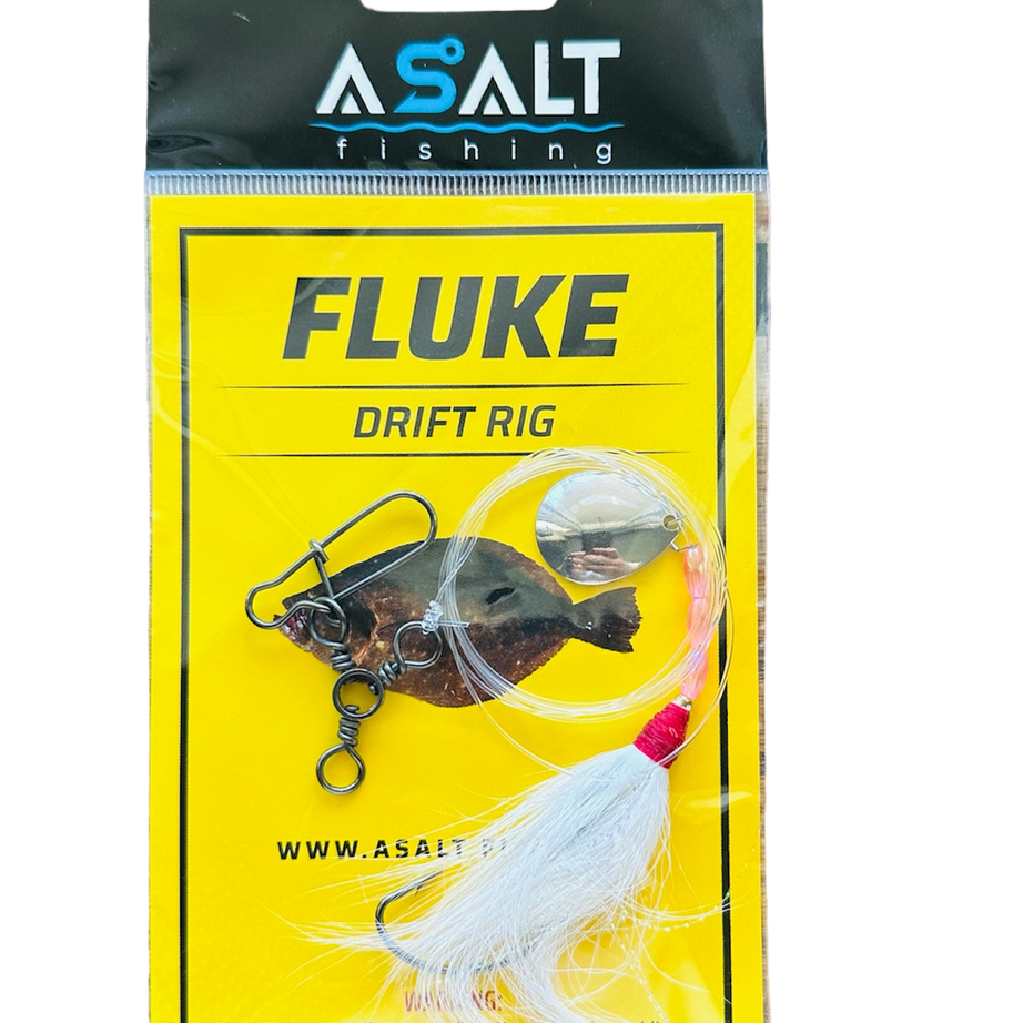 A packaged Fluke Drift Rig fishing lure with a colored bucktail teaser, spinner blade, and 3-WaySnap for sinker, displayed against a yellow background with the ASLT FISHING branding.